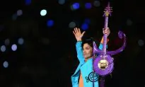 Minnesota Twins Baseball Team Honors Prince With Purple Lit Stadium