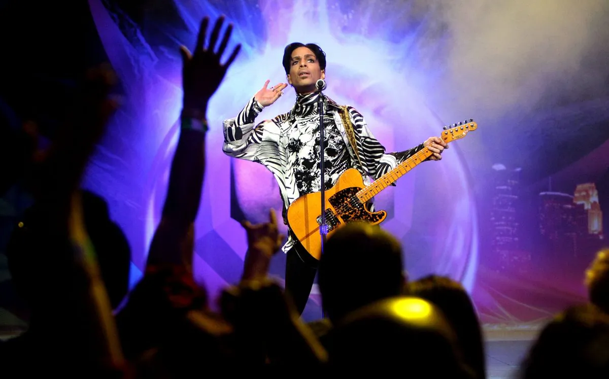 Prince performing at the NOKIA Theatre (now the Mirosoft Theatre) in Los Angeles on March 28, 2009. (Kristian Dowling/Getty Images for Lotusflow3r.com)
