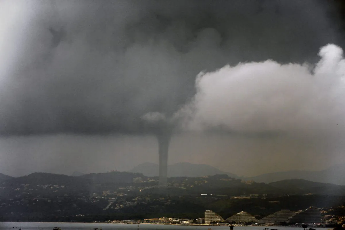 A tornado above Marina Baie des Anges in Nice, France, on June 9, 2013. According to the national meteorological office this occurs on average once a year in Nice. (Valery Hache/AFP/Getty Images)