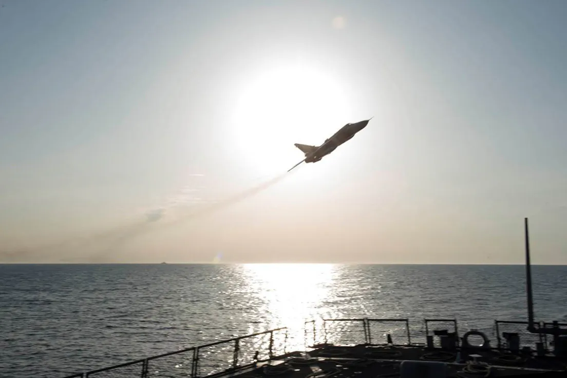 A Russian Sukhoi Su-24 fighter jet buzzes the USS Donald Cook, a guided-missile destroyer, in the Baltic Sea on April 12, 2016. (U.S. Navy via Getty Images)