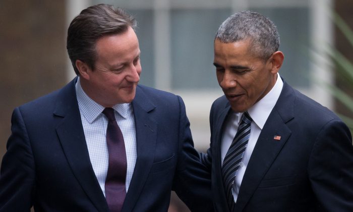 President Barack Obama greets British Prime Minister David Cameron as they meet at Downing Street in London, England, on April 22, 2016. (Matt Cardy/Getty Images)