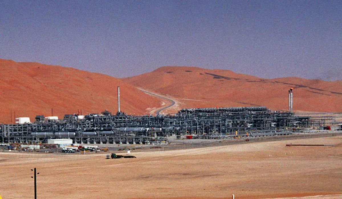An industrial plant strips natural gas from freshly pumped crude oil is seen at Saudi Aramco's Shaybah oil field at Shaybah in Saudi Arabia's Rub al-Khali desert on March 8, 2004. (AP Photo/Bruce Stanley)