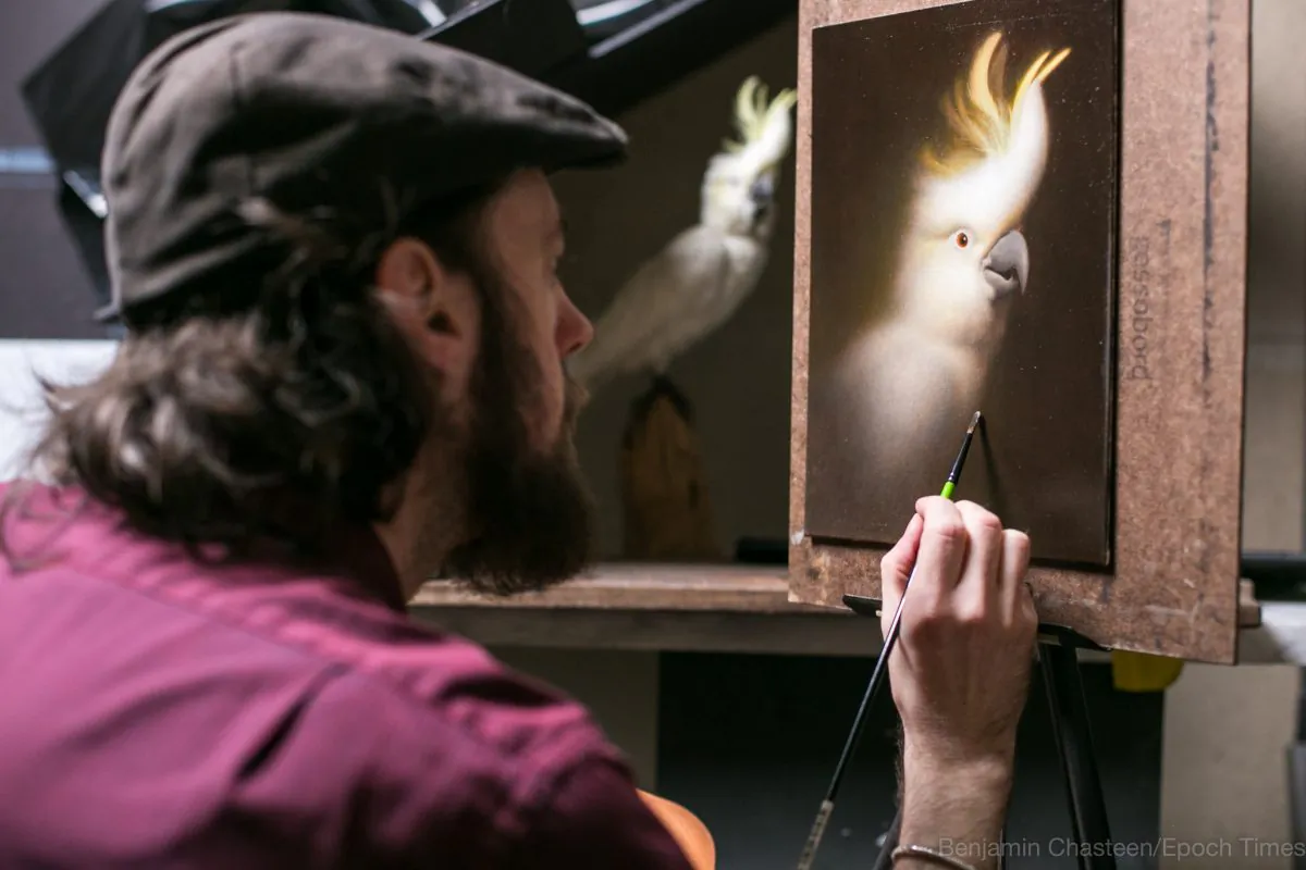 Artists Devin Cecil-Wishing, paints at the Grand Central Atelier in New York. (Benjamin Chasteen/Epoch Times)