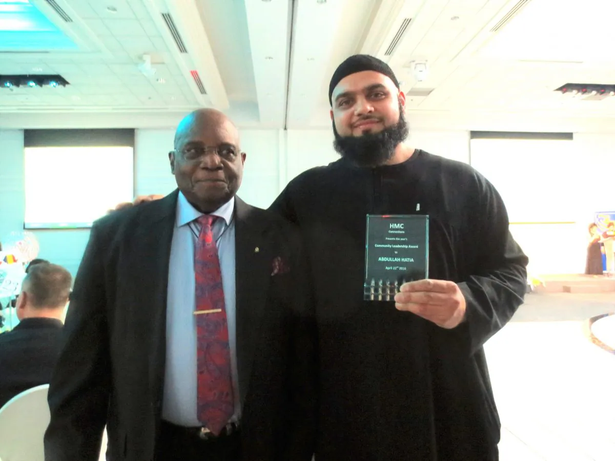 Abdullah Hatia (R), winner of the Bill Allison Community Leadership Award, and Bill Allison, founder of the award and president of the Oakville Multicultural Council. (Maria Matyiku)