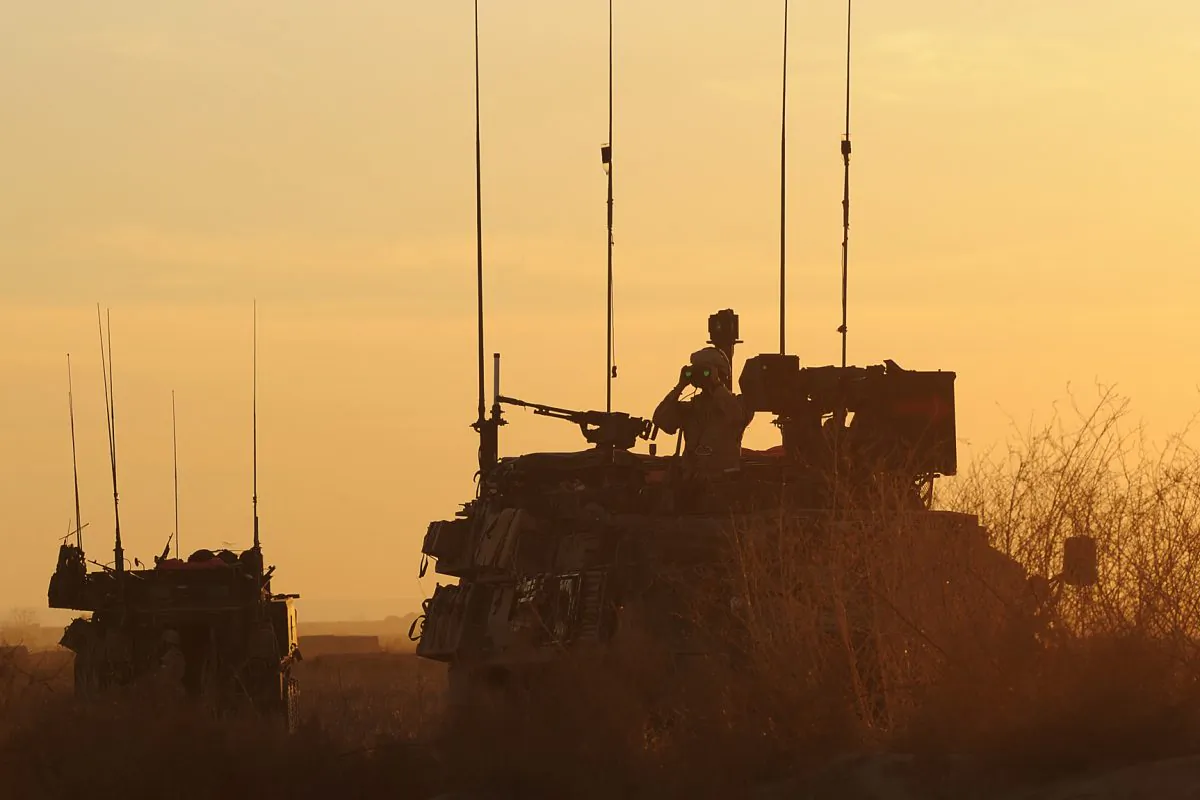 A convoy of Canadian light-armored vehicles over-watches the area near Khadan Village, Afghanistan, on Jan. 25, 2010. (Staff Sgt. Christine Jones/U.S. Air Force)