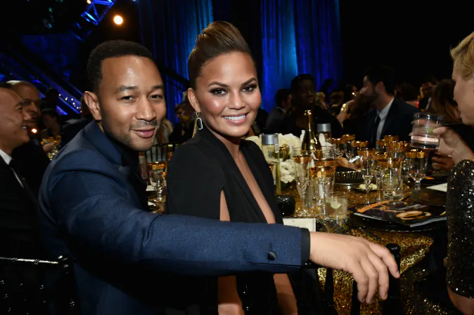 Recording artist John Legend (L) and model Chrissy Teigen attend The 42nd Annual Daytime Emmy Awards at Warner Bros. Studios on April 26, 2015 in Burbank, California. (Michael Buckner/Getty Images for NATAS)