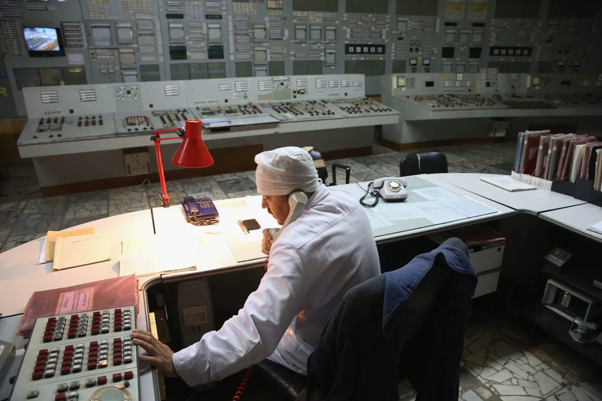 A worker makes a phone call in the control room of Reactor 2 inside the former Chernobyl nuclear power plant near Chernobyl, Ukraine, on Sept. 29, 2015. (Sean Gallup/Getty Images)