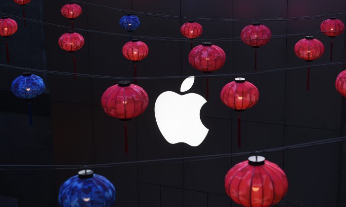 Lanterns hang outside an Apple store in a mall in Beijing on February 23, 2016. (Greg Baker/AFP/Getty Images)