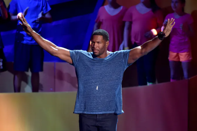 TV personality Michael Strahan speaks onstage at the Nickelodeon Kids' Choice Sports Awards 2015 at UCLA's Pauley Pavilion on July 16, 2015 in Westwood, California. (Photo by Kevin Winter/Getty Images)
