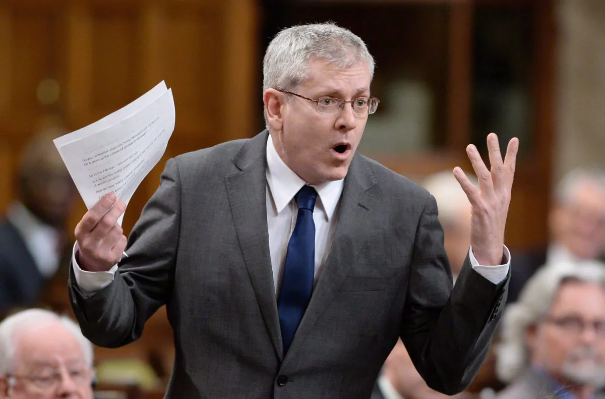 NDP MP Charlie Angus asks a question during question period in the House of Commons on Parliament Hill in Ottawa on Thursday, March 12, 2015. New Democrats are pushing to have the House of Commons ethics committee conduct an emergency study of the RCMP's illegal destruction of gun registry records. THE CANADIAN PRESS/Sean Kilpatrick