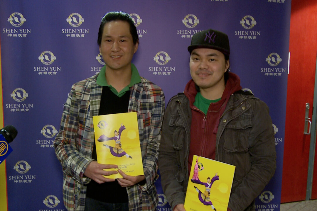 Chris Ang (L) and Kim Lee attended the April 26 Shen Yun performance at the Living Arts Centre, and were brought to tears by the “cultural awakening.” “All Chinese who want to know, and might not understand their culture, will have a great realization when they come to this,” said Mr. Ang. (NTD Television)