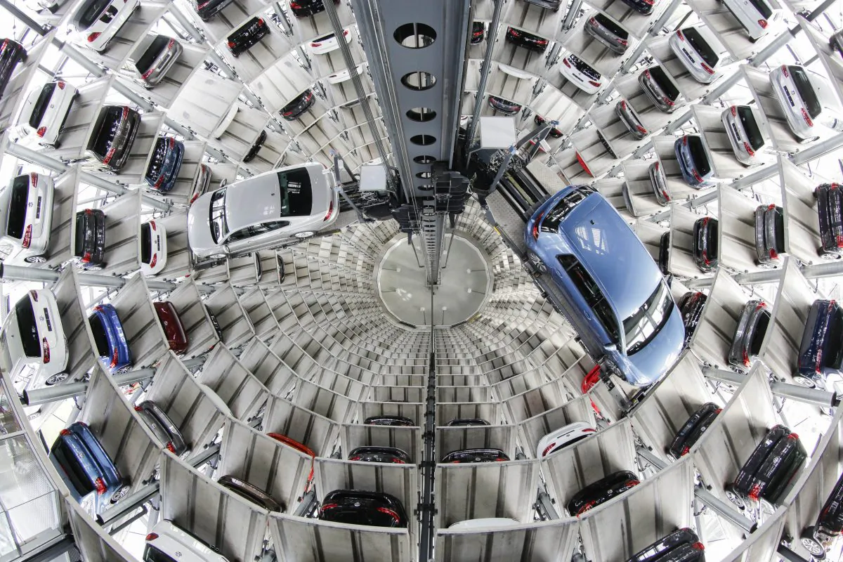 Volkswagen cars are presented to media inside a delivery tower prior to the company's annual press conference in Wolfburg, Germany, Thursday, April 28, 2016. (AP Photo/Markus Schreiber)