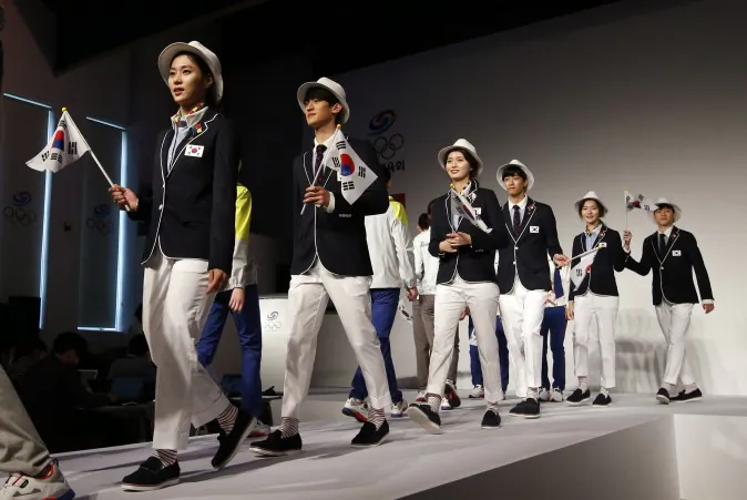 South Korean Olympic athletes and models present the South Korean Olympic team uniforms for the 2016 Rio de Janeiro Olympic Games at Korean National Training Center in Seoul, South Korea, Wednesday, April 27, 2016. South Korea's Olympic committee on Wednesday unveiled long-sleeved shirts and pants it says will help protect the country's Olympic athletes from the mosquito-borne Zika virus at this year's games in Rio de Janeiro. (AP Photo/Lee Jin-man)