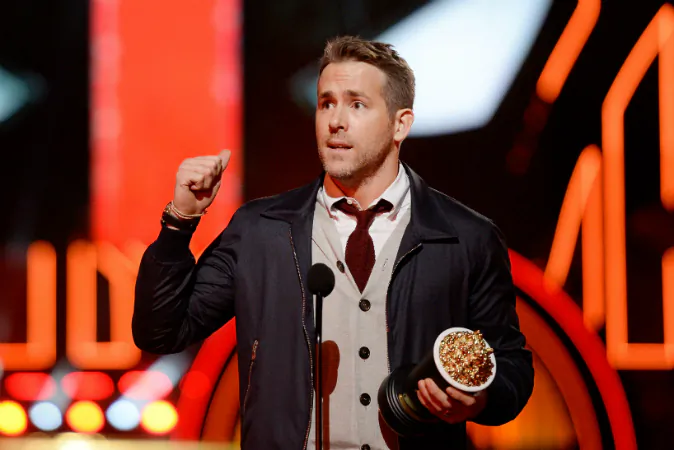 ctor Ryan Reynolds accepts Best Comedic Performance for 'Deadpool' onstage during the 2016 MTV Movie Awards at Warner Bros. Studios on April 9, 2016 in Burbank, California. MTV Movie Awards airs April 10, 2016 at 8pm ET/PT. (Photo by Kevork Djansezian/Getty Images)