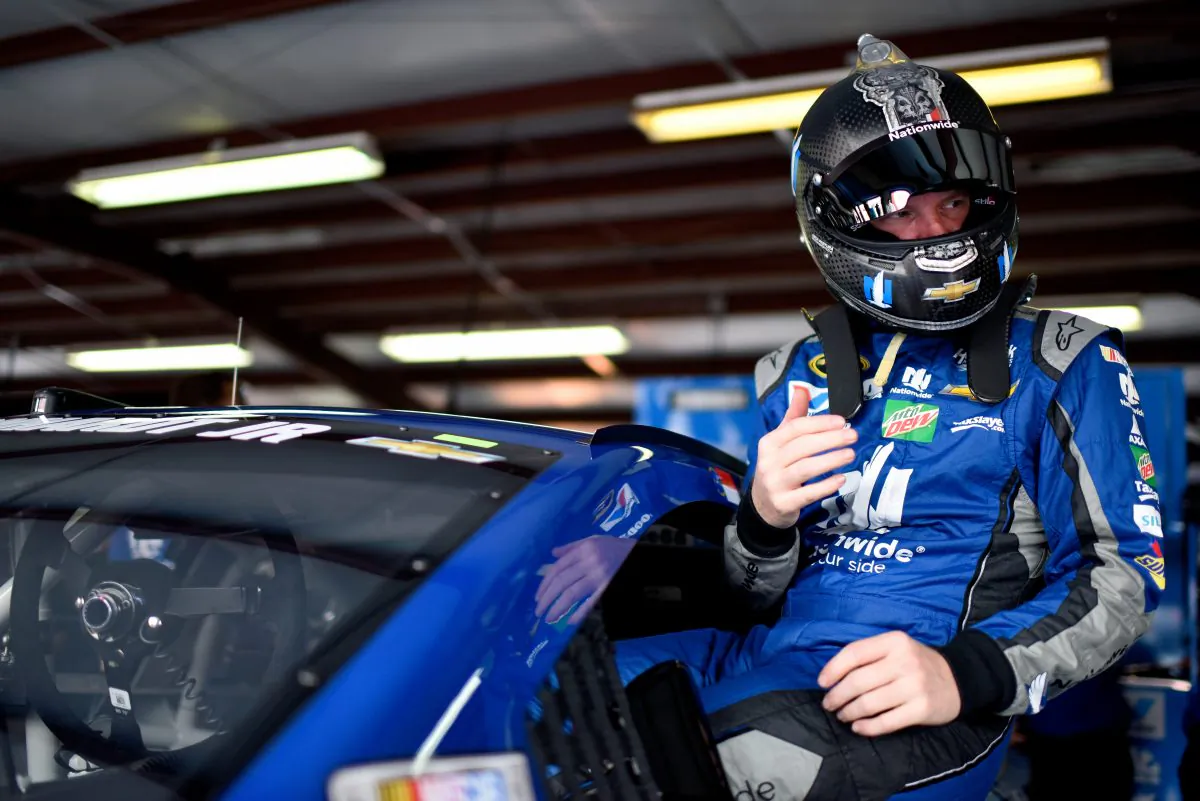 Dale Earnhardt Jr, driver of the #88 Nationwide Chevrolet, climbs into his car during practice for the NASCAR Sprint Cup Series GEICO 500 at Talladega Superspeedway on April 29. (Jared C. Tilton/Getty Images)