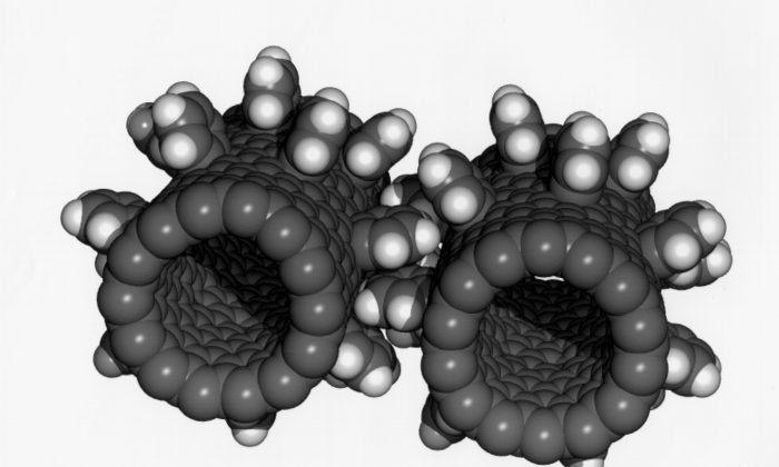 Nano-architects design materials that can work together at very tiny scales, like these interlocking gears made of carbon tubes and benzene molecules. (NASA)