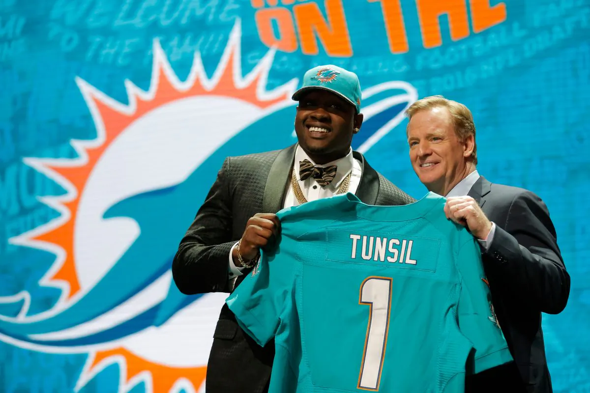 Former Ole Miss tackle Laremy Tunsil was selected by the Miami Dolphins with the 13th pick. (Jon Durr/Getty Images) 