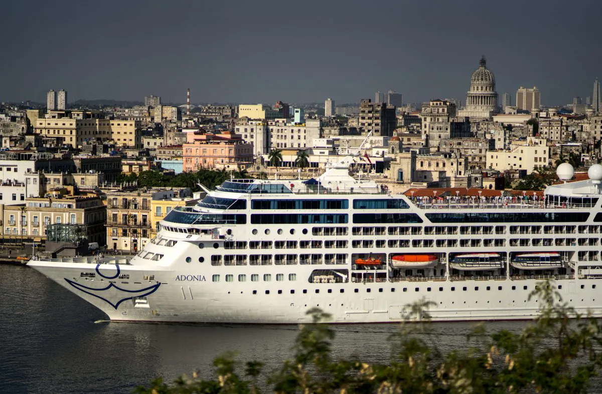 Carnival's Adonia cruise ship arrives from Miami in Havana, Cuba, Monday, May 2, 2016. The Adonia's arrival is the first step toward a future in which thousands of ships a year could cross the Florida Straits, long closed to most U.S.-Cuba traffic due to tensions that once brought the world to the brink of nuclear war. (AP Photo/Ramon Espinosa)