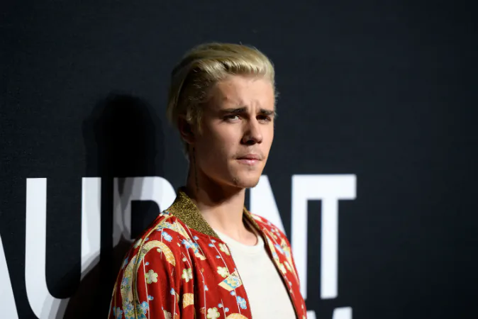 Musician Justin Bieber attends the Saint Laurent show at The Hollywood Palladium on February 10, 2016 in Los Angeles, California. (Photo by Kevork Djansezian/Getty Images)