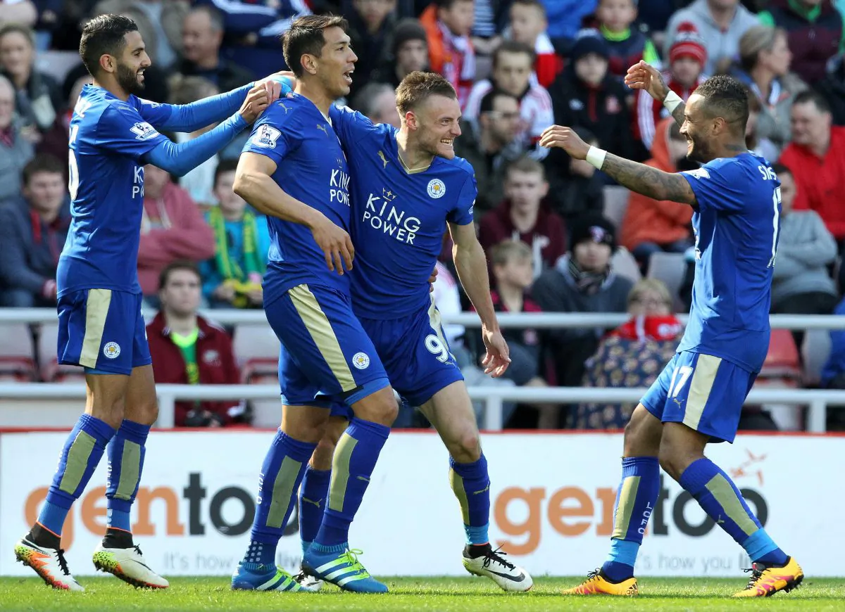 Leicester City striker Jamie Vardy celebrates scoring against Sunderland with Leonardo Ulloa, Riyad Mahrez, and Danny Simpson at the Stadium of Light in Sunderland on April 10, 2016. (Lindsey Parnaby/AFP/Getty Images)