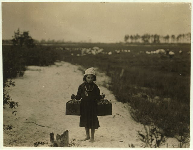 Rose Biodo, 10 years old. Working 3 summers. Minds baby and carries berries, two pecks at a time. This is the fourth week of school and the people here expect to remain two weeks more.  In Brown Mills, N.J., on Sept. 28, 1910. (L. W. Hine/LOC)