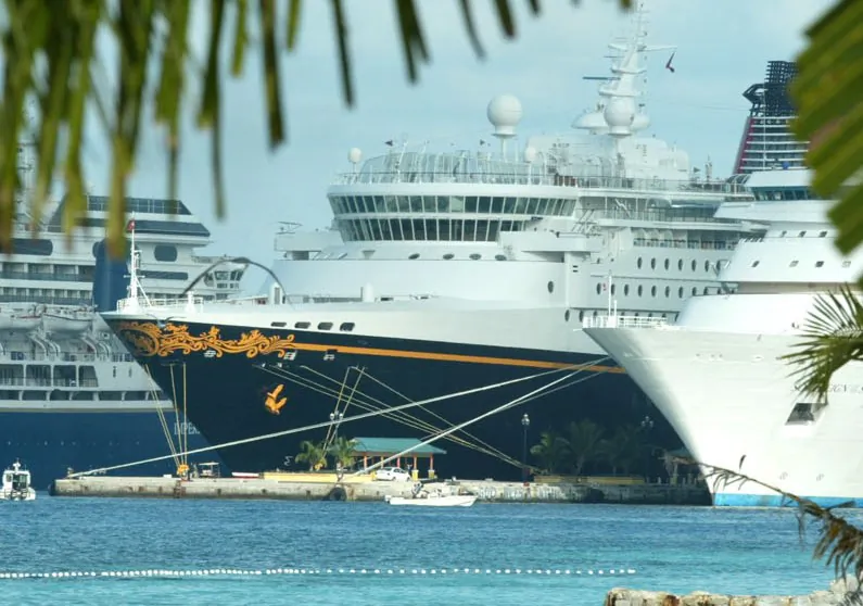 The Disney Wonder cruise ship is shown in Nassau Harbor in the Bahamas, Friday, Dec. 27, 2002. (AP Photo/Tim Aylen)