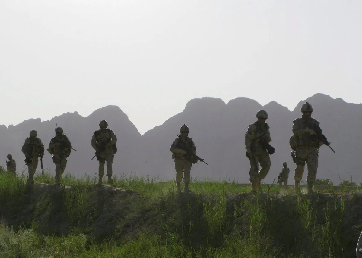 Canadian soldiers patrol an area in the Dand district of southern Afghanistan on June 7, 2009. The government is drafting a letter of assurance it hopes will end a class-action lawsuit by Afghan veterans related to an overhaul of their benefits and entitlements initiated 10 years ago. (The Canadian Press/Colin Perkel)