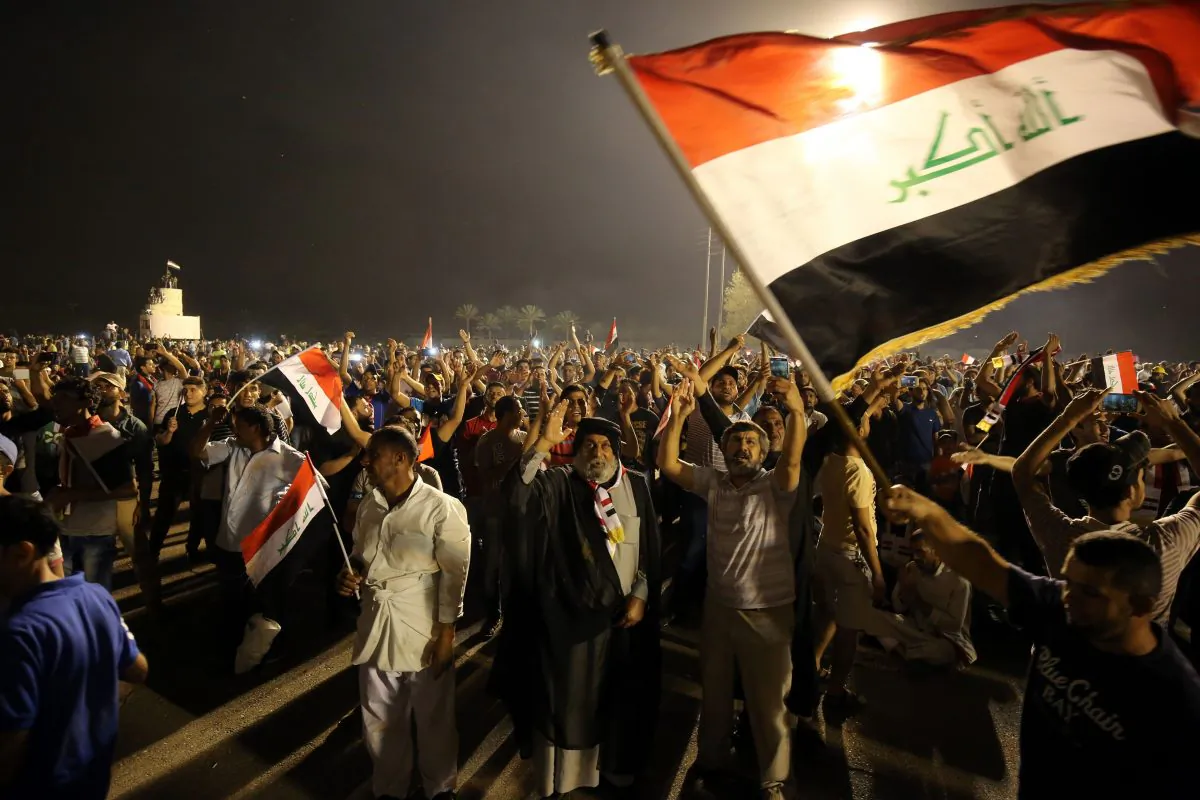 Supporters of cleric Moqtada al-Sadr gather in the courtyard of celebrations after breaking into Baghdad's heavily fortified "Green Zone" on April 30, 2016. Thousands of angry protesters broke into Baghdad's Green Zone and stormed the parliament building after lawmakers again failed to approve new ministers. Jubilant supporters of cleric Moqtada al-Sadr invaded the main session hall, shouting slogans glorifying their leader and claiming that they had rooted out corruption. (Ahmad al-Rubaye/AFP/Getty Images)