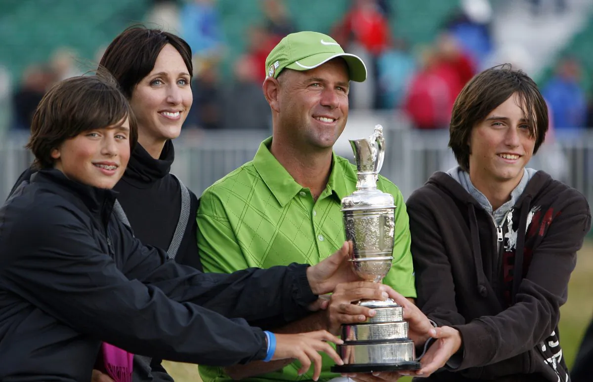 Stewart Cink (2nd R) won the British Open in 2009 with his wife Lisa (2nd L) and children Connor (R) and Reagan (L) by his side. (Peter Muhly/AFP/Getty Images)