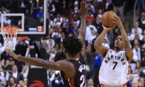 Kyle Lowry: Toronto Raptors Point Guard Forces Overtime Against Miami Heat With Half-Court Shot