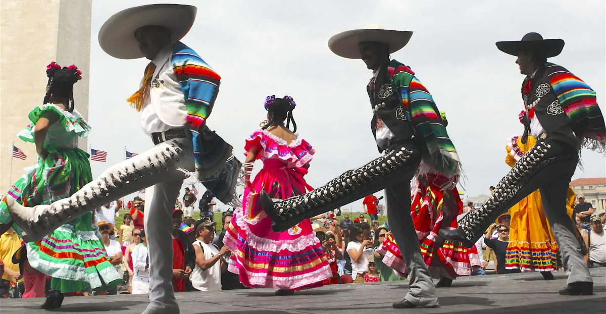 Members of the Maru Montero Dance Company perform at the Sylvan Theater near the Washington Monument during the 18th Annual National Cinco de Mayo Festival in Washington Sunday, May 2, 2010. (AP Photo/Pablo Martinez Monsivais)