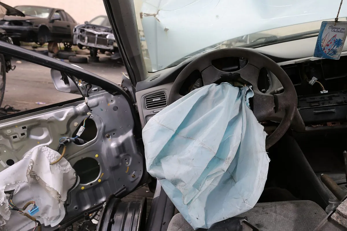 A deployed airbag in a Honda Accord in Medley, Fla., on May 22, 2015. (Joe Raedle/Getty Images)