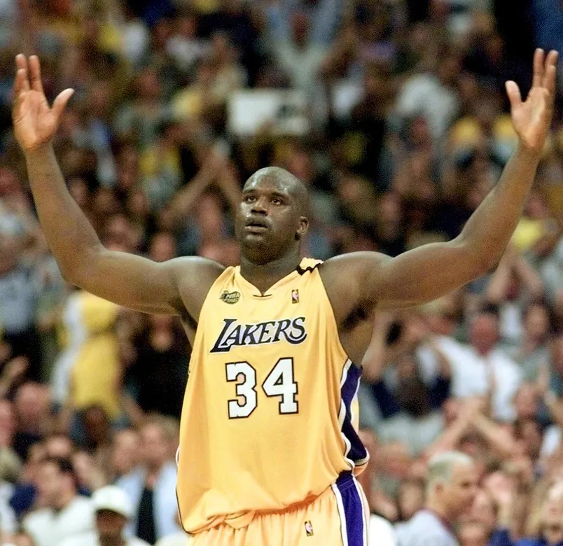 LOS ANGELES, UNITED STATES:  Shaquille O'Neal of the Los Angeles Lakers celebrates a basket 09 June, 2000, during the first half of game 2 of the NBA Finals against the Indiana Pacers at Staples Centers in Los Angeles, CA. The Lakers beat the Pacers 111-104 to take a 2-0 lead in the best-of-seven series.  (ELECTRONIC IMAGE)  AFP PHOTO/Jeff Haynes (Photo credit should read JEFF HAYNES/AFP/Getty Images)