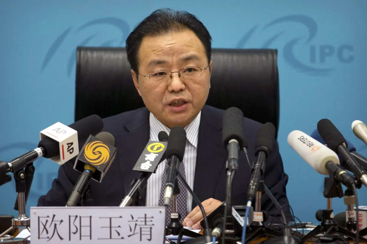 Ouyang Yujing, Director-General of the Department of Boundary and Ocean Affairs of China's Ministry of Foreign Affairs, speaks during a press briefing about China's South China Sea policies in Beijing, Friday, May 6, 2016. China is rallying Russia and other friendly states to back a push to exclude the U.S. and its allies from the festering South China Sea dispute, despite its insistence that countries without a direct territorial claim should remain firmly neutral. (AP Photo/Mark Schiefelbein)