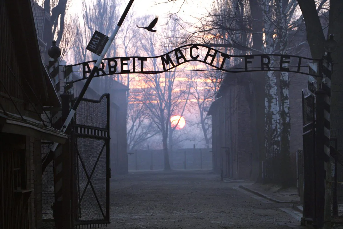 The main gate of the former Nazi death camp of Auschwitz-Birkenau, with the lettering “Arbeit macht frei” (Work makes you free), in Oswiecim, Poland, on Jan. 13, 2005. (Janek Skarzynski/AFP/Getty Images)