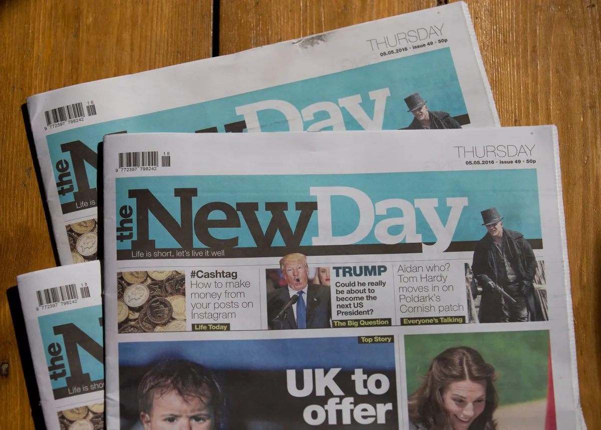 Copies of The New Day newspaper pictured in south London on May 5, 2016. Britain's first new national daily newspaper in 30 years is to shut, its owners said Thursday, just over two months after it was launched promising to prove that print news can survive the Internet age. Trinity Mirror group said it was "disappointing" that The New Day would print its last edition on Friday—just weeks after its launch on Feb. 29—but circulation had fallen "below our expectations." (Justin Tallis/AFP/Getty Images)