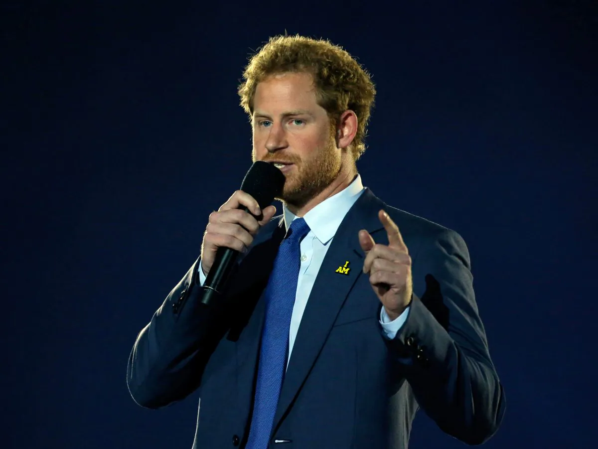 Britain's Prince Harry addresses the audience during the opening ceremony for the Invictus Games, Sunday, May 8, 2016, in Kissimmee, Fla. (AP Photo/John Raoux)