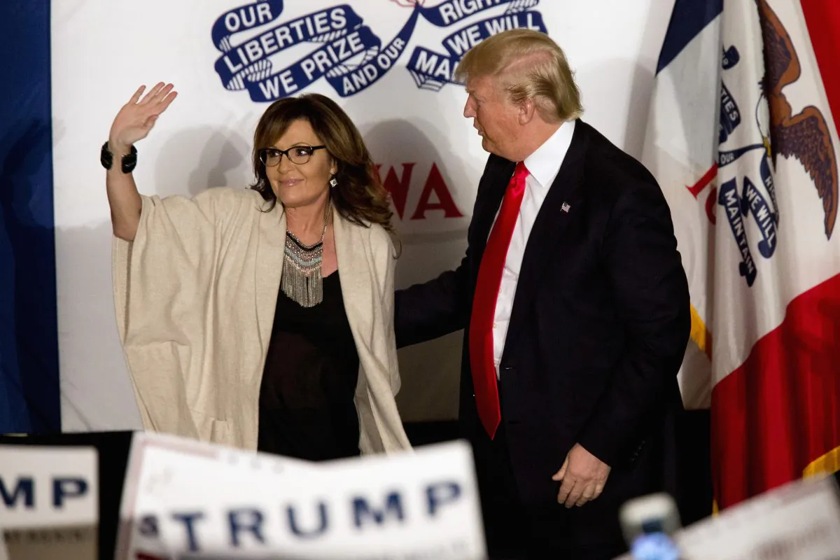 In this February 2016 file photo, Republican presidential candidate Donald Trump is joined on stage by former Republican vice presidential candidate, and former Alaska Gov. Sarah Palin in Cedar Rapids, Iowa. Former President Trump has endorsed Palin in the 2022 special congressional election for Alaska. (Mary Altaffer/AP Photo)
