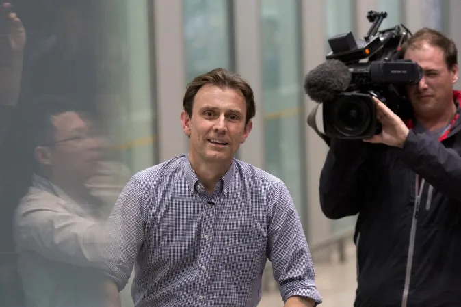 BBC's journalist Rupert Wingfield-Hayes arrives at the airport in Beijing, China, Monday, May 9, 2016. North Korea on Monday expelled the BBC journalist it had detained days earlier for allegedly "insulting the dignity" of the authoritarian country, while it continued to keep other foreign media away from the first-in-decades ruling party congress they had been invited to attend. (AP Photo/Ng Han Guan)