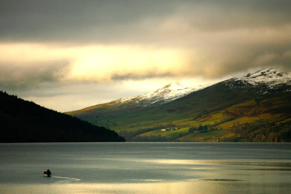 Anglers mark the opening of the salmon fishing season on the River Tay at Kenmore in Kenmore, Scotland, on Jan. 15, 2008. (Jeff J. Mitchell/Getty Images)