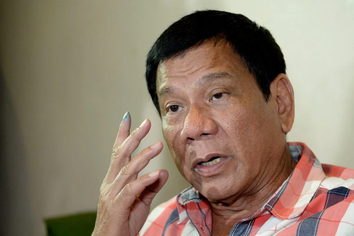 Philippine president-elect Rodrigo Duterte is interviewed by reporters at a hotel in Davao City, on the southern island of Mindanao, Philippines, on May 9, 2016. (Noel Celis/AFP/Getty Images)