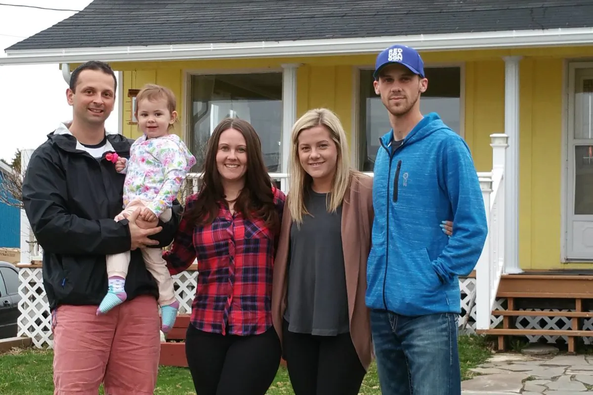 (Left to Right) Brad Foley (holding Lyla Foley), Anna Foley, Reagan Gale, and Wallace Gale in Codroy Valley, Newfoundland, on May 10, 2016. (Tara MacIsaac/Epoch Times)