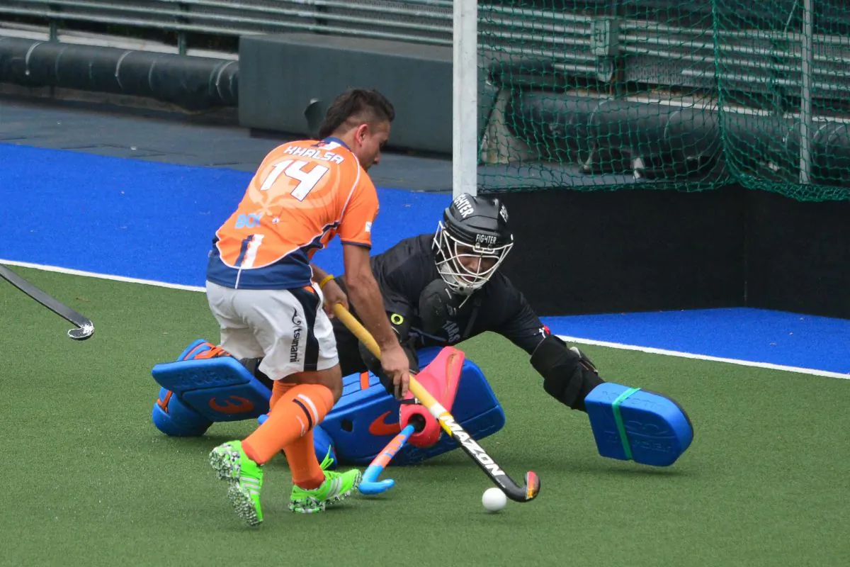 Khalsa's Inderpal Singh goes on to score two goals for his club in the Holland Cup semi-final against Pakistan Association at King’s Park on Sunday May 8, 2016, when he rounds the keeper not once but twice. (Eddie So)