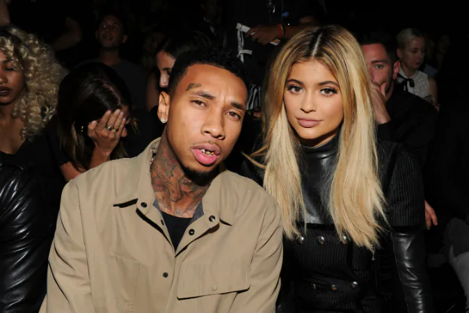 Tyga (L) and Kylie Jenner attend the Alexander Wang Spring 2016 fashion show during New York Fashion Week at Pier 94 on September 12, 2015 in New York City. (Photo by Craig Barritt/Getty Images)