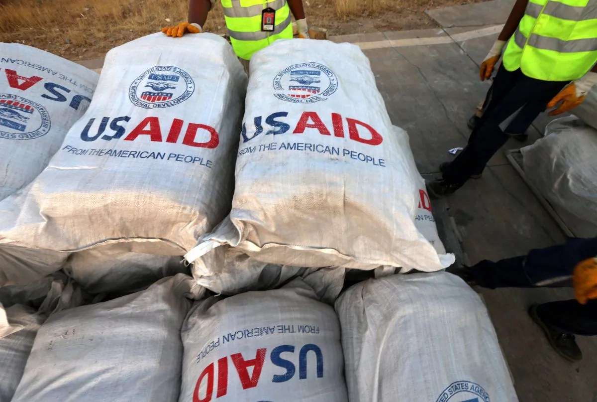 Humanitarian aid supplies from USAID unloaded from a plane in northern Iraq, on September 2nd, 2014. USAID has suspended aid for Syria following corruption investigation. (SAFIN HAMED/AFP/Getty Images)