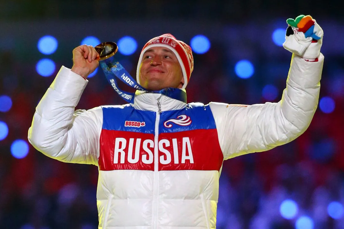 Gold medalist Alexander Legkov of Russia celebrates in the medal ceremony for the Men's 50 km Mass Start Free during the 2014 Sochi Winter Olympics Closing Ceremony at Fisht Olympic Stadium on February 23, 2014 in Sochi, Russia.  (Photo by Ryan Pierse/Getty Images)