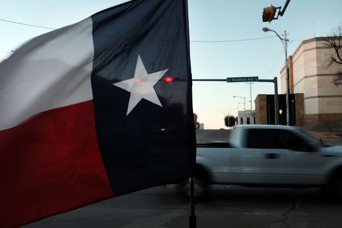 The Texas flag flies in downtown Sweetwater, Texas on Jan. 19, 2016.  (Spencer Platt/Getty Images)