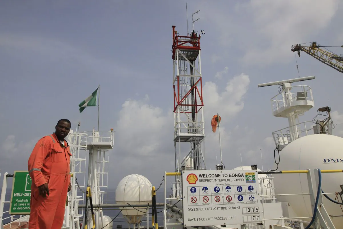 A member of Shell staff on the Bonga offshore oil Floating Production Storage and Offloading vessel off the coast of the Niger Delta in Nigeria no Dec. 26, 2011. (AP Photo/Sunday Alamba)
