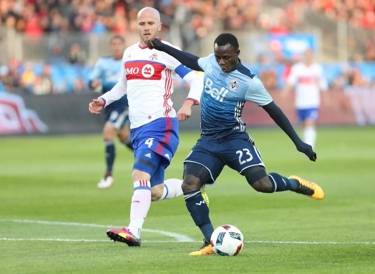Vancouver Whitecaps winger Kekuta Manneh scores against Toronto FC in Toronto on May 14, 2016. The Gambian scored two goals against the second best defense in MLS. (The Canadian Press/Peter Power)