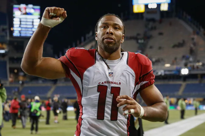 Wide receiver Larry Fitzgerald #11 of the Arizona Cardinals heads off the field after defeating the Seattle Seahawks 39-32 at CenturyLink Field on November 15, 2015 in Seattle, Washington. (Otto Greule Jr/Getty Images)